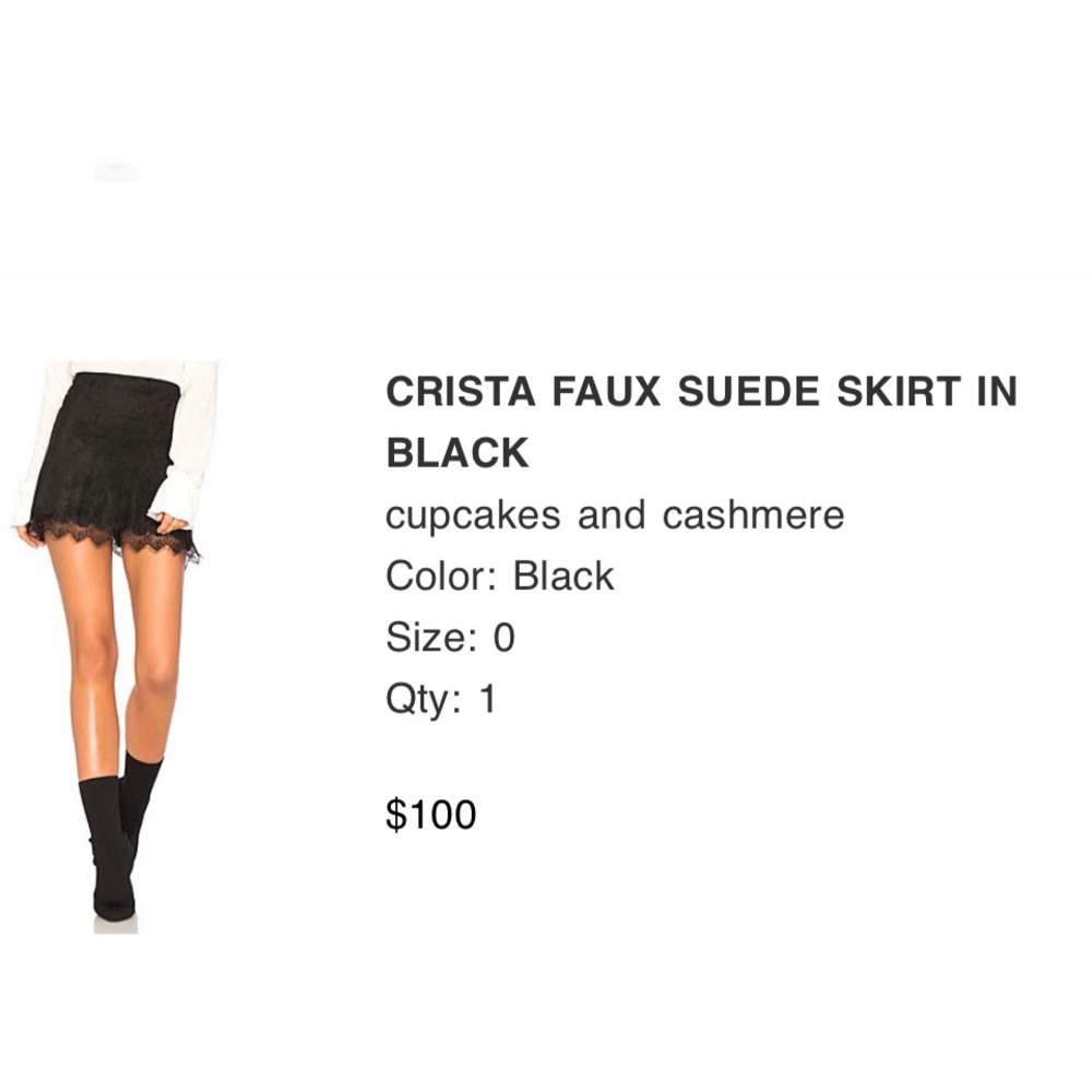 “Cupcakes and Cashmere” black laced hem mini skirt